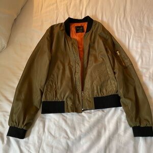 Khaki and black bomber jacket with orange lining #bomberjacket

Size large